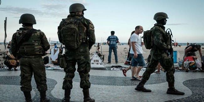 Photo of الجيش يتولى الأمن في ريو دي جانيرو بعد أعمال عنف