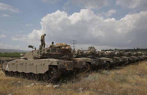 الجيش الإسرائيلي: قوات إيرانية أطلقت عشرين صاروخا بسوريا
