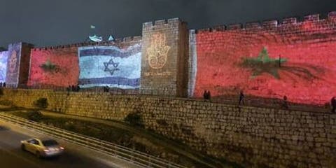بعد التوقيع على اتفاقيات التعاون.. اسرائيل تضع علم المغرب على أسوار القدس