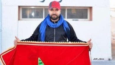 Photo of الدوزي يرفع العلم المغربي بمعبر الكركرات