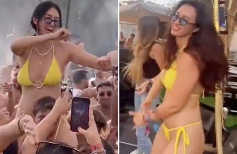 بالبيكيني الأصفر.. رهينة سابقة لدى "حماس" تحتفل فوق الأعناق بحريتها (فيديو)